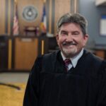 Judge Jack Ewing, Presiding